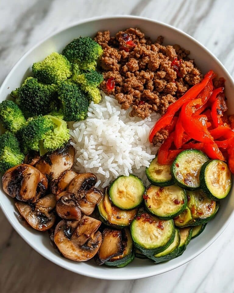 Spicy Ground Beef Stir-Fry Bowl with Garlic Veggies & Steamy Rice Recipe