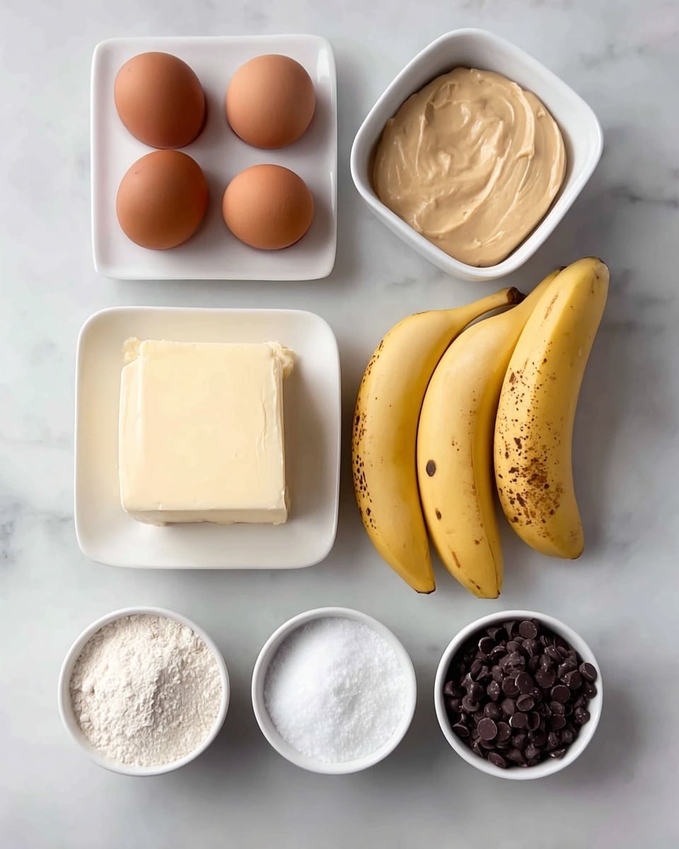 The image shows eight ingredients laid out neatly on a white marbled surface. On the left, there are three brown eggs arranged in a triangle shape. Next to them on the right, two ripe yellow bananas lie side by side, slightly curved. Above the bananas is a square white bowl filled with thick, light brown puree. Below the bananas is a rectangular white dish holding a block of soft cream-colored butter. Around these, three small white round bowls contain different baking essentials: one has coarse white granules of sugar, one holds fine white powder (likely baking soda), and the last one is filled with small, dark chocolate chips. Finally, at the bottom left, a larger white bowl is filled with fine white flour. All items are well spaced and clearly shown. photo taken with an iphone --ar 4:5 --v 7