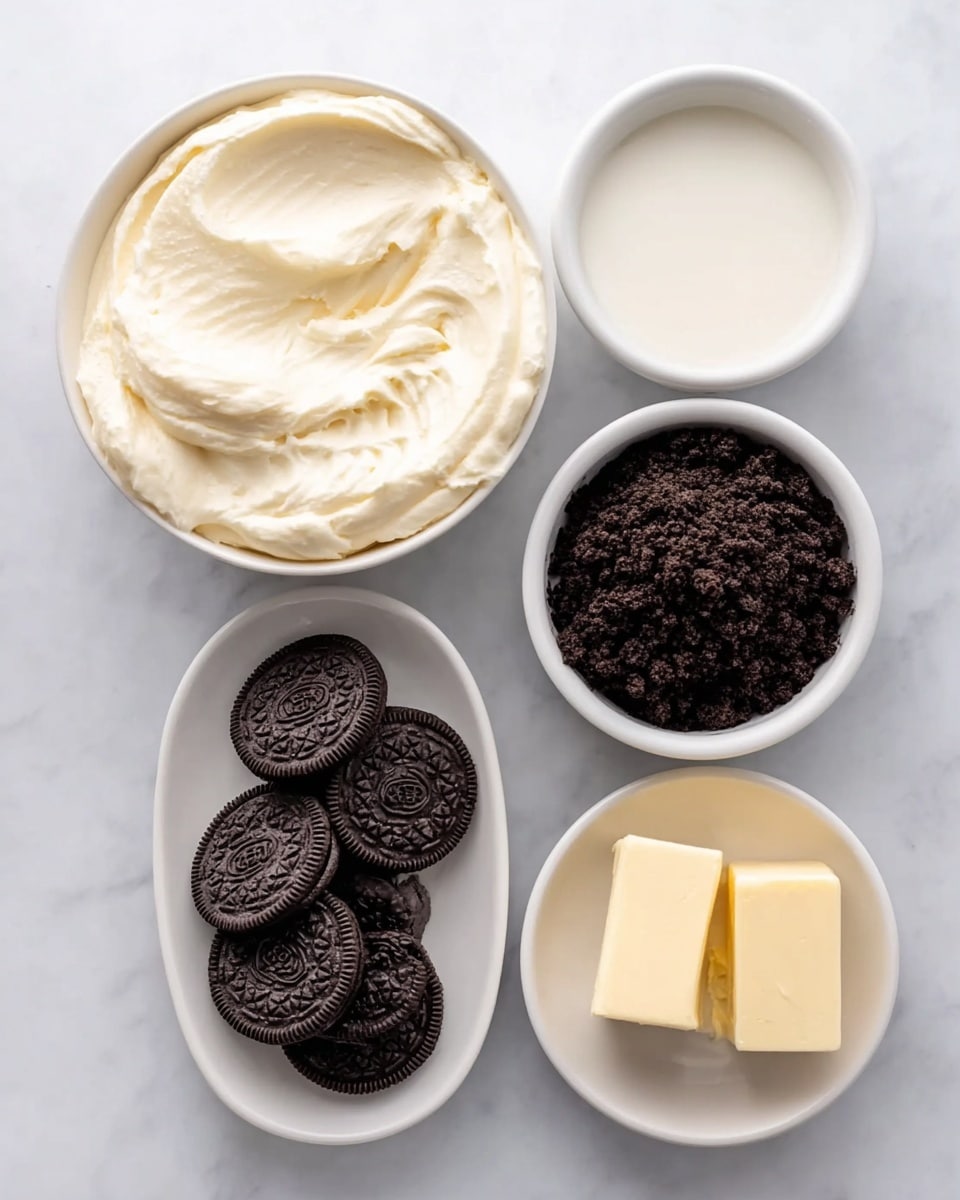 The image shows five white bowls and plates on a white marbled surface. One bowl is filled with creamy, thick white frosting that has a smooth, fluffy texture with swirls on top. Next to it, another bowl holds fine, dark brown crushed cookie crumbs with a slightly rough texture. A small bowl contains soft, pale yellow slices of butter. There is a small bowl with a white liquid, likely cream or milk. Lastly, a white plate has a neat stack of whole dark chocolate sandwich cookies with white cream filling visible between the layers. The arrangement is neat and clean, with a clear contrast between the dark cookies and the light ingredients. photo taken with an iphone --ar 4:5 --v 7