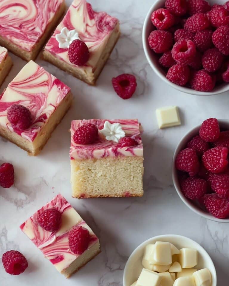 White Chocolate Raspberry Cake with Raspberry Jam and Cream Cheese Frosting Recipe
