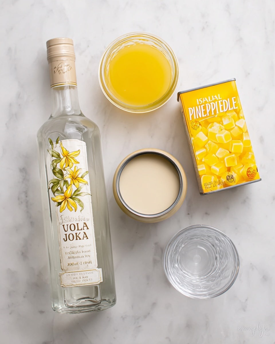 The image shows five items on a white marbled surface arranged loosely in a square shape. There is a tall clear glass bottle of vanilla-flavored vodka on the left side with a beige cap and a white label decorated with yellow vanilla flowers and green leaves. Just above the bottle is a small glass jar filled with a yellow liquid. To the right of the jar is an opened can with a creamy pale beige liquid inside. Below the can is a yellow box of Island Pineapple Jell-O, showing bright yellow gelatin cubes on the front. In the bottom right corner, there is a clear empty glass cup with thick walls. photo taken with an iphone --ar 4:5 --v 7