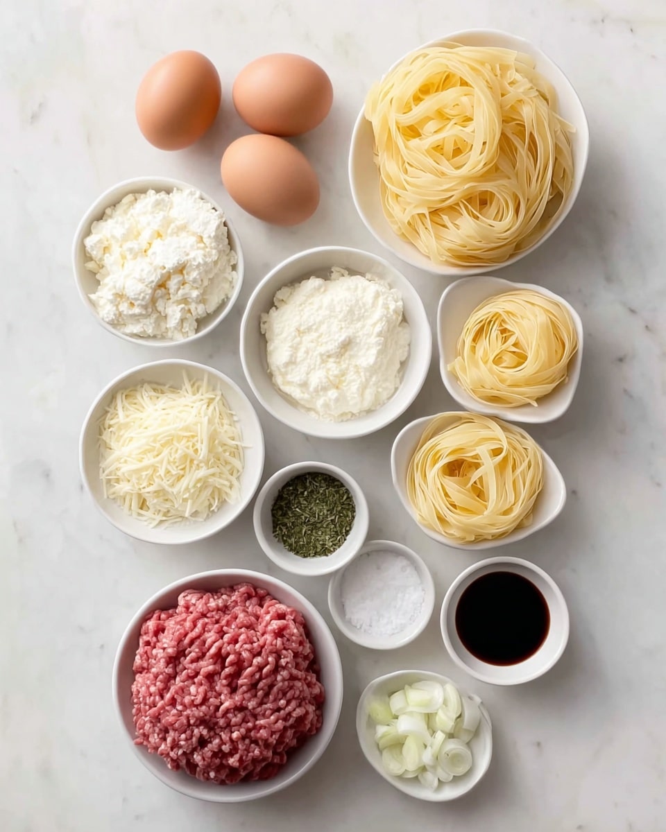 The image shows eight small white bowls and three brown eggs arranged neatly on a white marbled surface. The top right bowl contains a nest-like bundle of pale yellow uncooked pasta. To the left are three brown eggs placed close together. Below the pasta, there is a mound of pink ground meat. Around these larger items are bowls holding different ingredients: white fluffy ricotta cheese, grated white cheese, chopped pale yellow onions, dark soy sauce or balsamic vinegar in a small bowl, green dried herbs in two bowls, and white granulated salt. All ingredients are cleanly presented with clear color contrasts on the white marbled background. Photo taken with an iphone --ar 4:5 --v 7