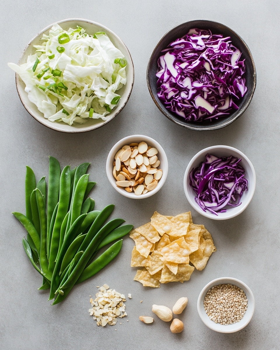 A wooden bowl filled with a colorful salad showing many thin layers of shredded greens like pale green cabbage, bright green snow peas, and dark purple radicchio leaves, with light golden crispy strips scattered on top. The textures vary from soft leafy greens to crunchy elements, all mixed together loosely inside the bowl, sitting on a white marbled surface. photo taken with an iphone --ar 4:5 --v 7