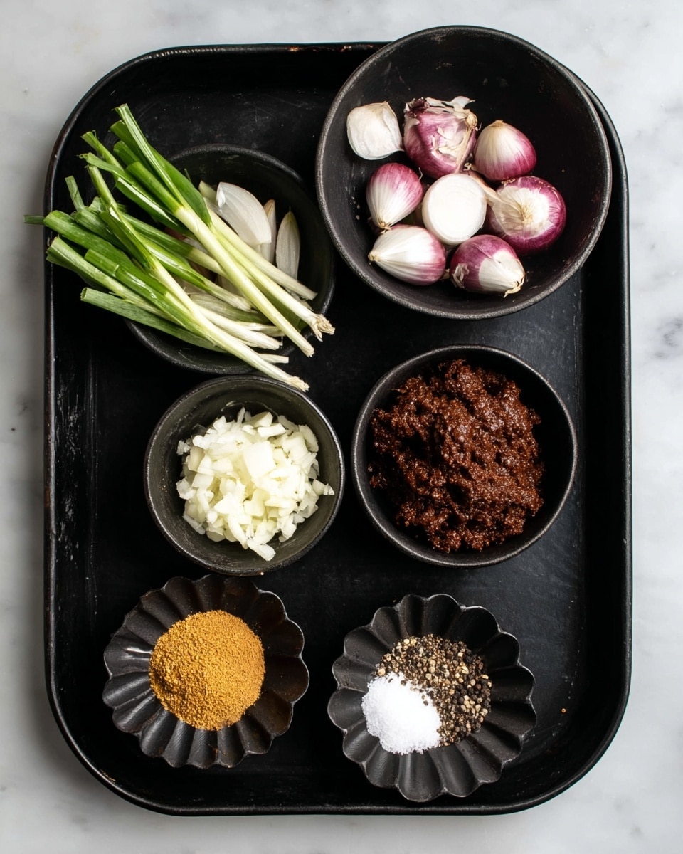 A black tray holds six black bowls arranged neatly on a white marbled surface. The largest bowl on the right contains a dark brown, crumbly textured spice mix. On the left, a medium bowl is filled with fresh green onions with white and light purple bulb ends. Below them are four smaller bowls: one with finely chopped pale garlic, another with light brown powder, one with white salt crystals, and the last with black pepper powder. The color contrast between the green onions, dark spice, and light powders stands out against the black bowls and white marbled background. photo taken with an iphone --ar 4:5 --v 7