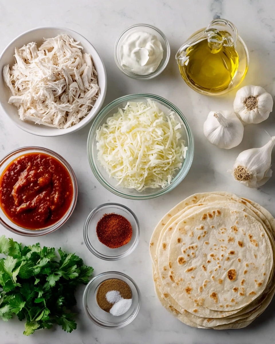 The image shows a white marbled surface with several bowls and ingredients arranged neatly. There is a white bowl with shredded white chicken, a smaller clear glass bowl with red sauce, another clear bowl with shredded white and yellow cheese, and a third clear bowl filled with chopped white onions. To the right, there is a stack of round white tortillas with light brown spots. Also visible are two whole garlic bulbs, a bunch of fresh green cilantro, a small clear bowl with white sour cream, a small white dish of red chili powder, a small clear bowl of brown spice, and a clear bottle filled with yellow olive oil. The setup looks ready for making a layered dish photo taken with an iphone --ar 4:5 --v 7