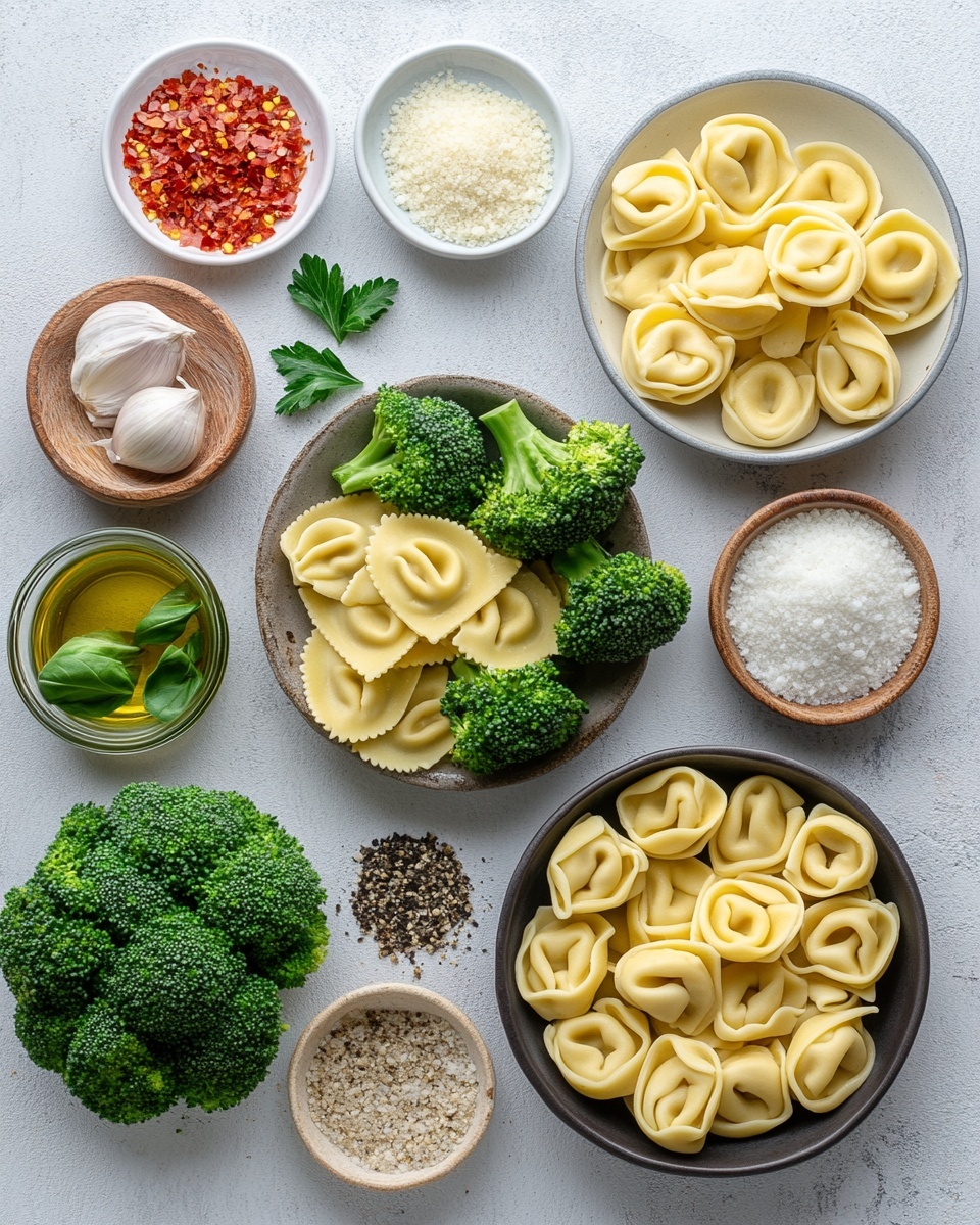 This image shows a large black baking tray filled with a layered baked dish. The bottom layer is hidden, but on top there are yellow tortellini pasta pieces with some slightly browned edges, bright green broccoli florets, and browned round sausage slices scattered evenly. The dish is generously topped with melted white cheese that has some light golden brown spots and is sprinkled with finely chopped green herbs and shredded white cheese. The tray sits on a white marbled surface. Photo taken with an iphone --ar 4:5 --v 7