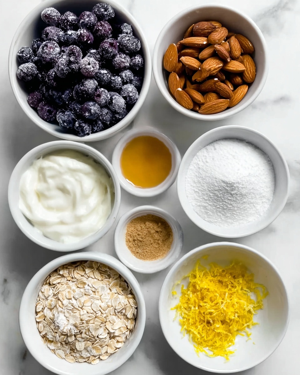 The image shows a white rectangular baking dish filled with a two-layer dessert. The bottom layer is a dark, glossy purple berry filling with whole fruit pieces visible around the edges. The top layer is a golden brown crumble made from oats and small bits of nuts, covering the fruit mixture unevenly but fully. The dish sits on a white marbled surface, with a white cloth that has blue stripes placed to the right. The crumble has a rough, chunky texture and a warm toasted color, while the berry layer looks thick and juicy. photo taken with an iphone --ar 4:5 --v 7