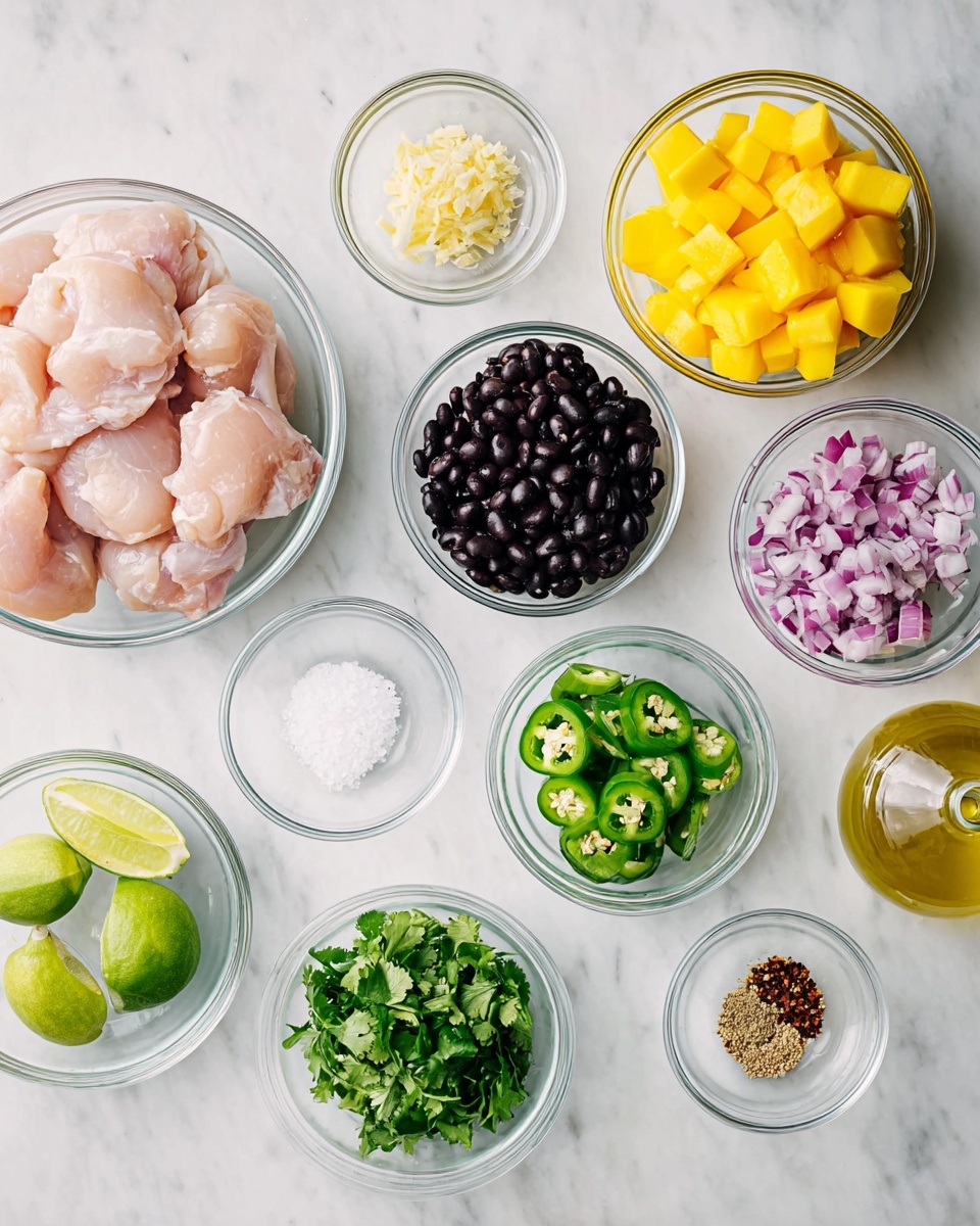 The image shows many small clear glass bowls on a white marbled surface, each with different colorful ingredients. One large bowl holds raw pale pink chicken pieces that are smooth and moist. Another bowl features bright yellow cubes of mango with a soft texture. There is a bowl filled with small shiny black beans. A smaller bowl contains sliced green jalapeños with white seeds inside. Some chopped fresh green cilantro leaves fill another bowl, while a separate bowl holds small diced purple and white red onions. There is a clear bowl with halved bright green limes. One small bowl contains white salt, and another small bowl has a mix of finely minced garlic and spices, showing brown, beige, and green tones. A glass bottle with golden olive oil is also visible near the top right. The clean white marbled surface and clear bowls give a fresh and organized look to the ingredients. photo taken with an iphone --ar 4:5 --v 7