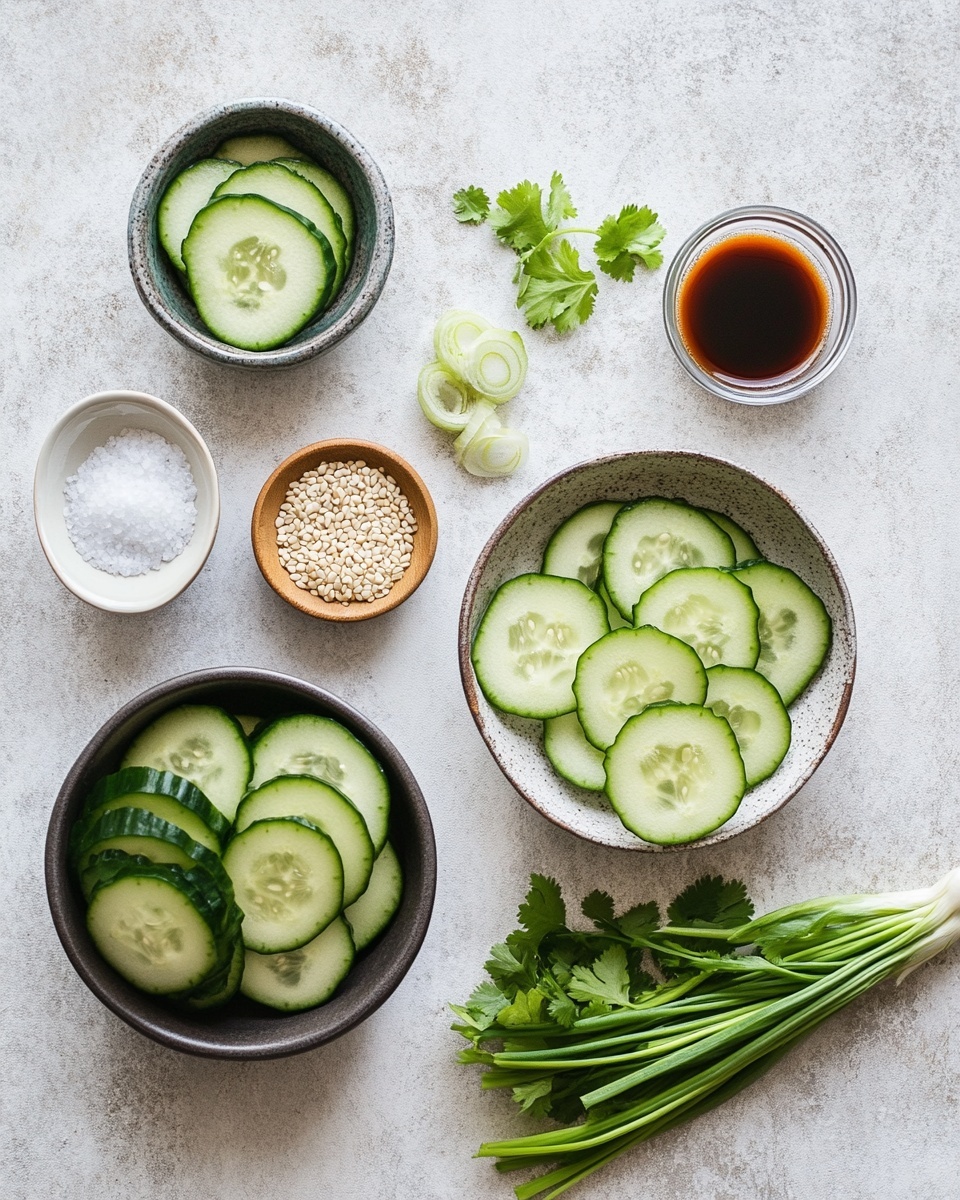 A close-up of a bowl filled with sliced green cucumbers layered evenly, sprinkled heavily with white sesame seeds, red chili powder, and chopped green onions. The cucumbers have a glossy and slightly wet texture, mixed with small green cilantro leaves scattered on top and around. The bowl is white, resting on a white marbled surface with some green herbs placed casually nearby. The mix of bright green, white, and red colors contrast vividly in the fresh, spicy salad. Photo taken with an iphone --ar 4:5 --v 7